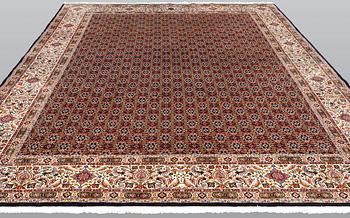 A Moud part silk carpet, signed, 335 x 250 cm.