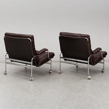 BRUNO MATHSSON, a pair of 'Karin' easy chairs, late 20th Century.