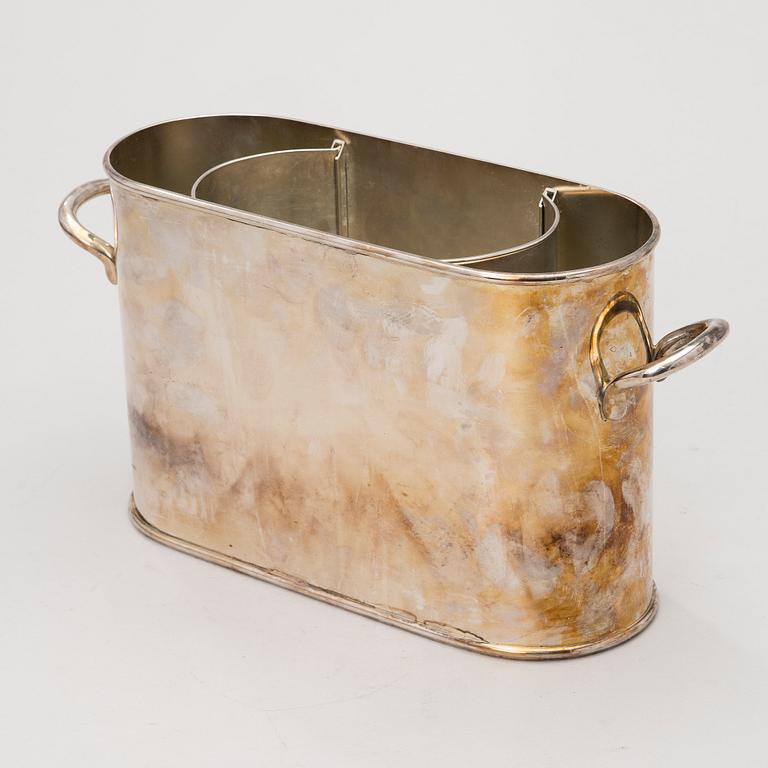 A WHITE METAL DOUBLE COOLER.