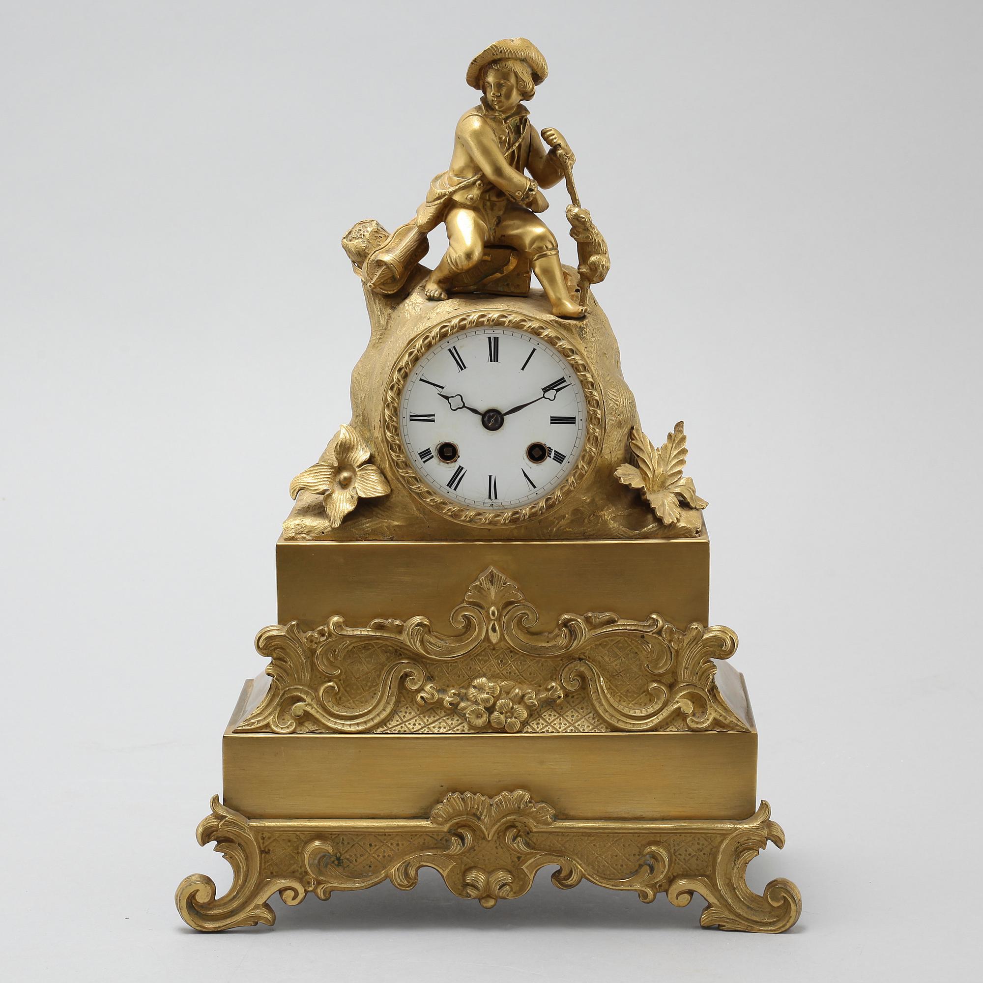 A late Empire table clock, clockwork marked "Japy Freres", made in the mid/second half of the 20th century.