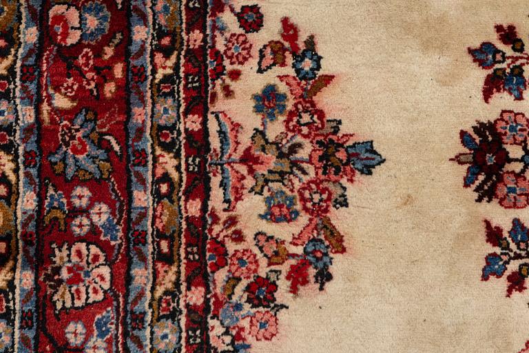 An oriental carpet, c. 370x260 cm.
