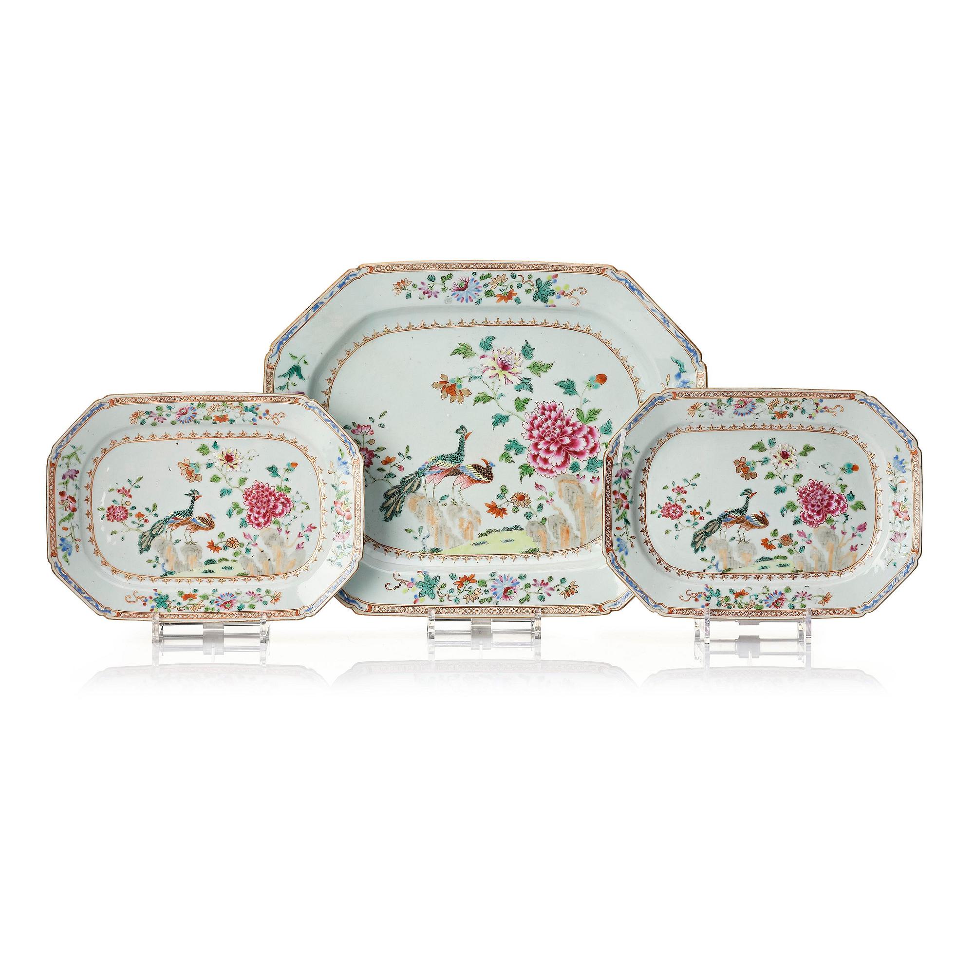 A set of three famille rose 'double peacock' serving dishes, Qing dynasty, Qianlong (1736-95).