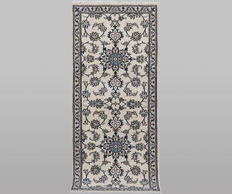 A runner carpet, Nain, part silk, ca 197 x 77 cm.