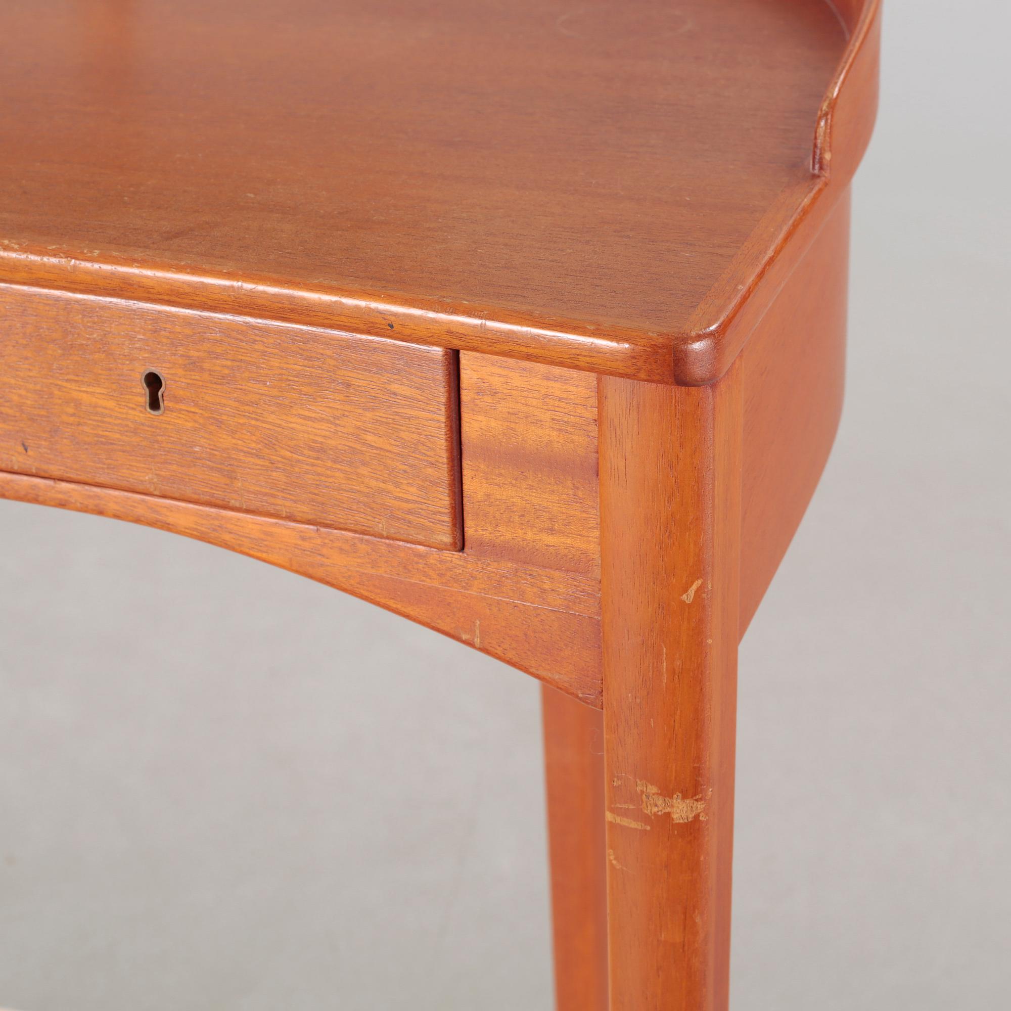 a table with mirror "Birgitta" veneered with teak designed by Carl Malmsten for Bodafors Möbelfabrik,