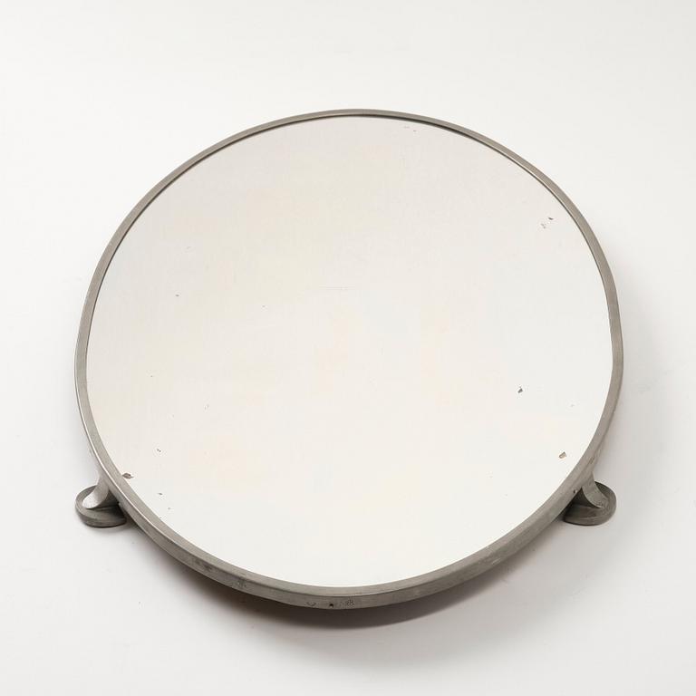 Firma Svenskt Tenn, a pewter and mirror glass surtout de table model "934 a", Stockholm 1931.