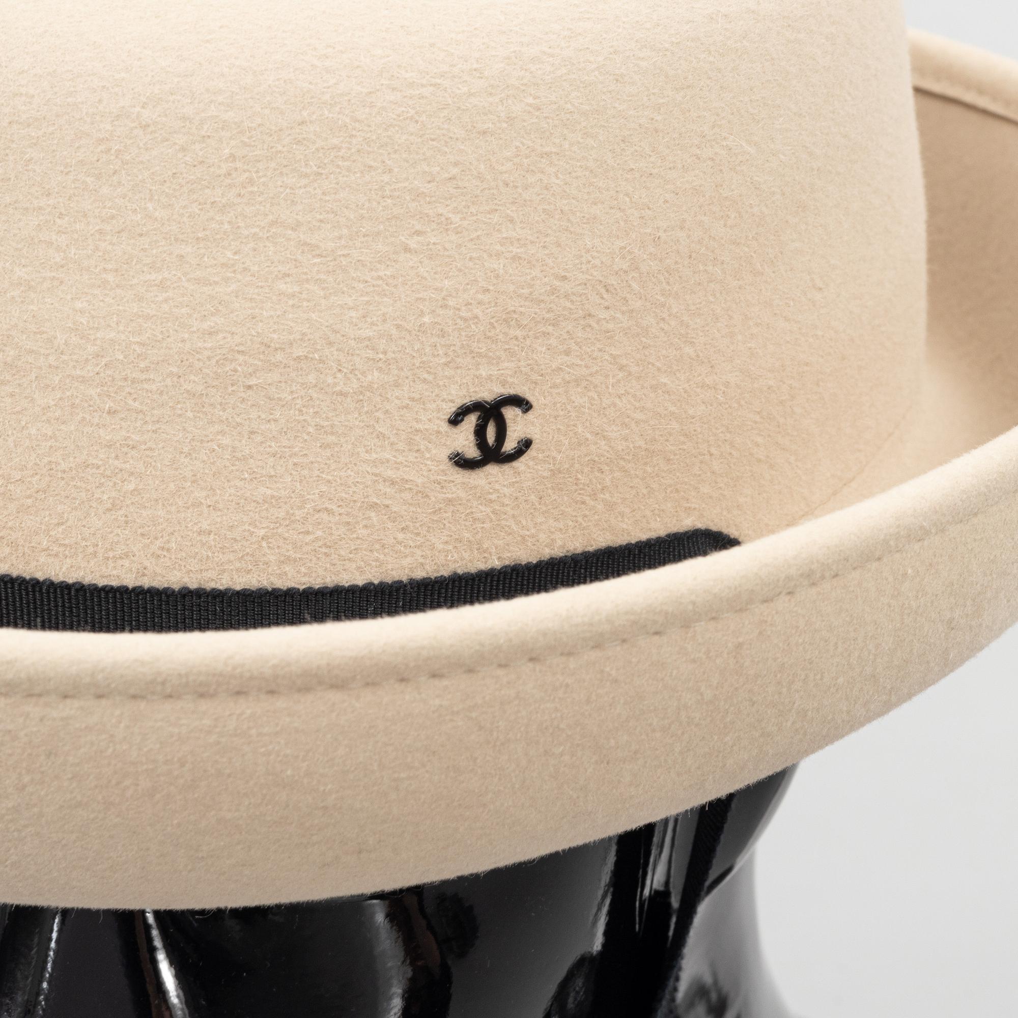 Chanel, a rabit hair hat with ribbon, size S.