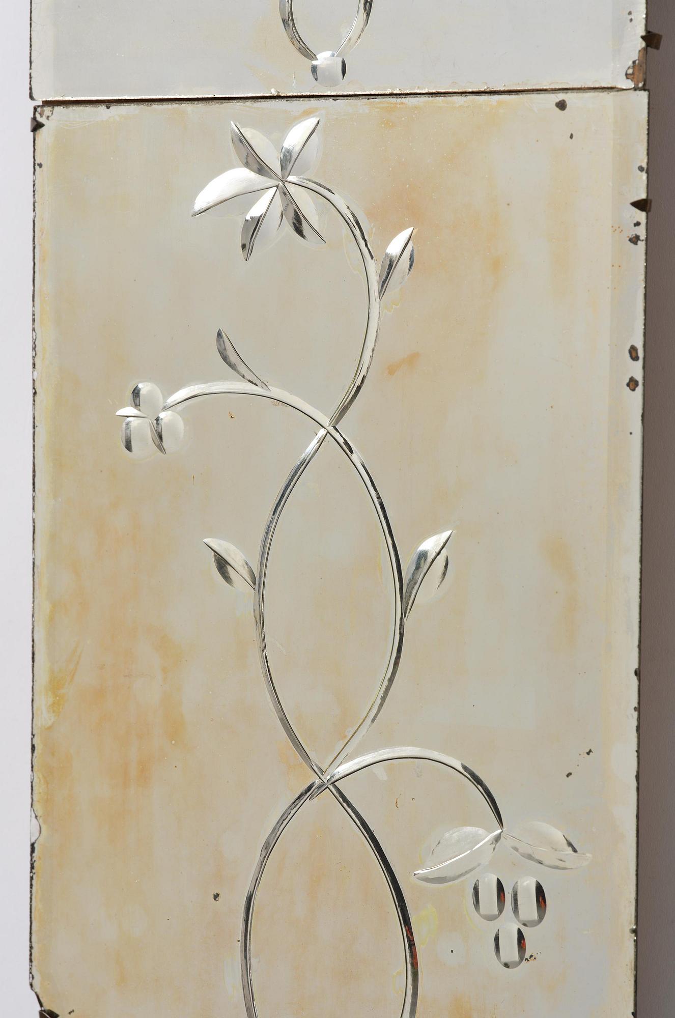 A pair of Swedish engraved-glass one-branch girandole mirrors, later part 18th century.