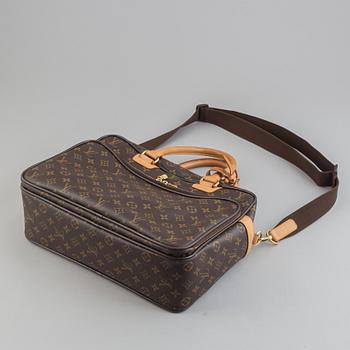 Louis Vuitton, a monogram canvas carry on bag.
