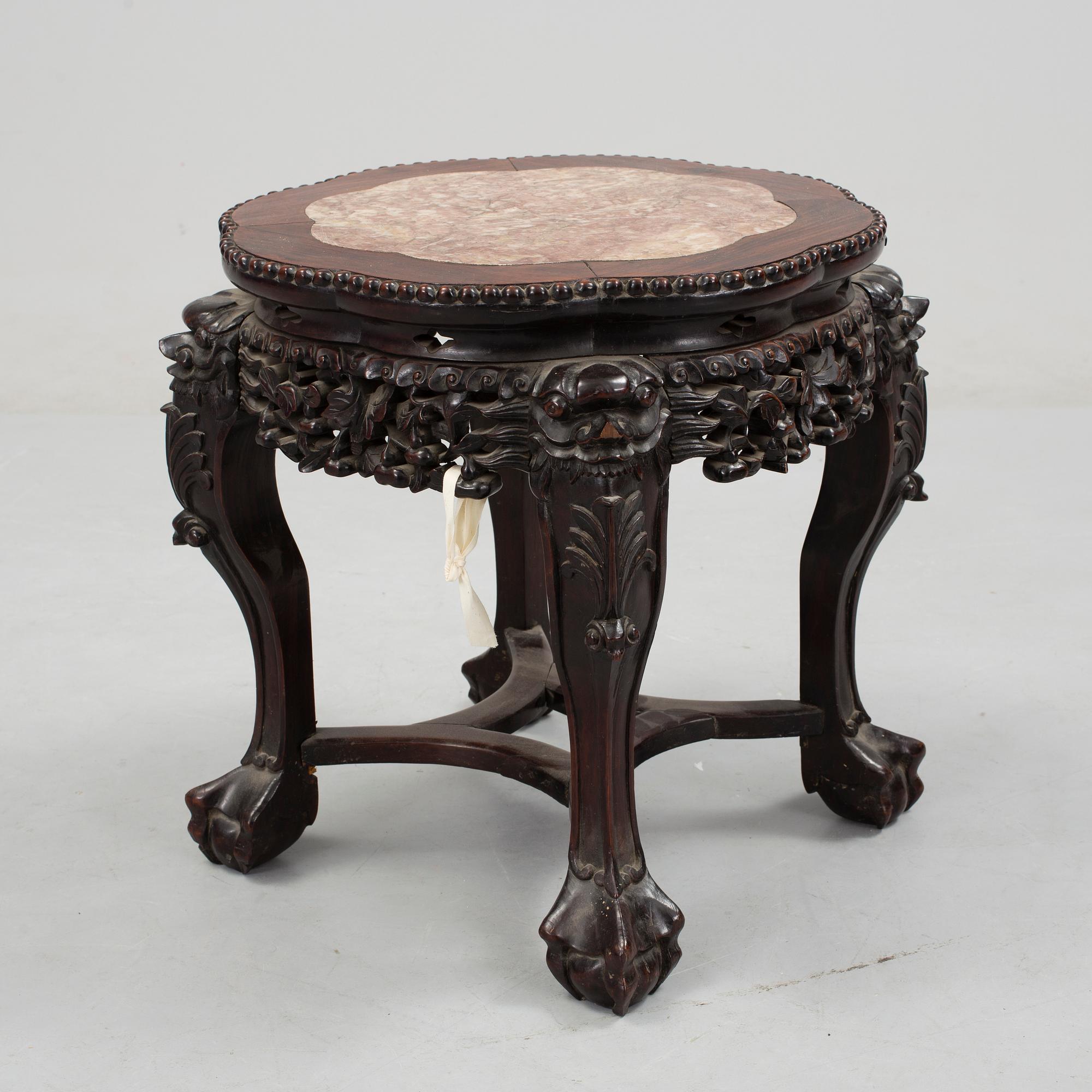 A Chinese hardwood table with marble top, 20th Century.