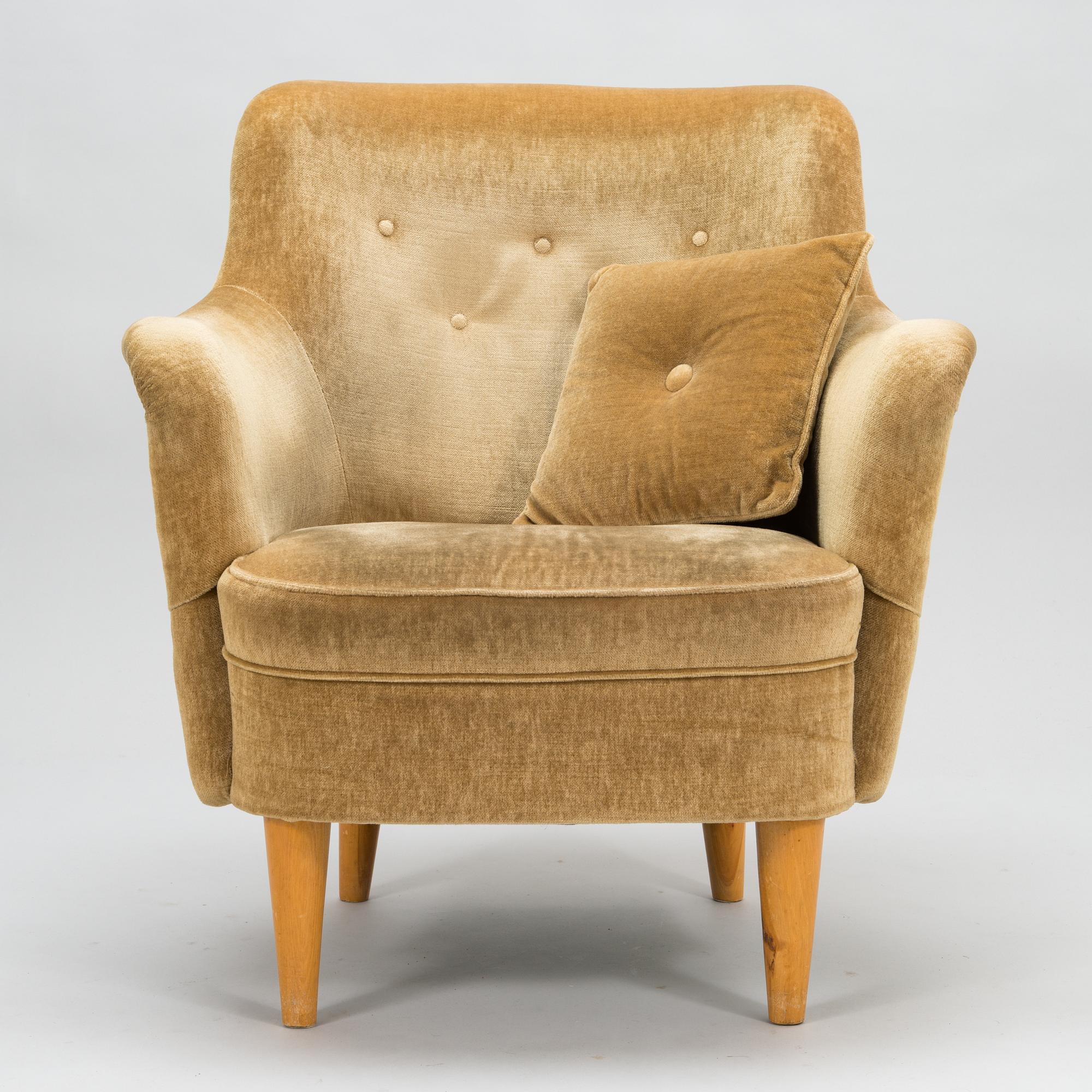 A mid-20th-century sofa and armchair.