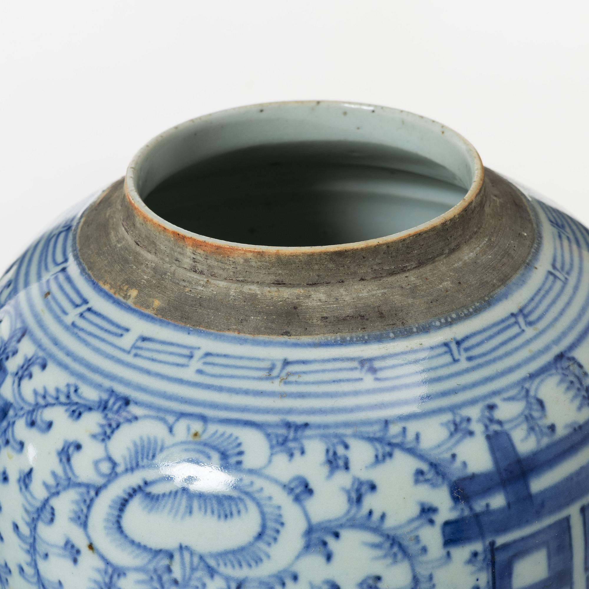 Two similar Chinese blue and white porcealin jars with wooden covers, Qing dynasty, 19th Century.