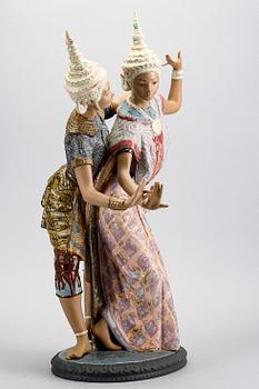 A Lladro stone ware figurine.