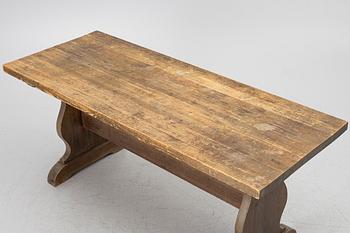 A solid pine dining table, 20th century.