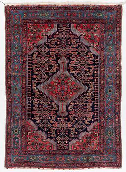 AN antique Hamadan, Northwest Persia, c. 190 x 132 cm.