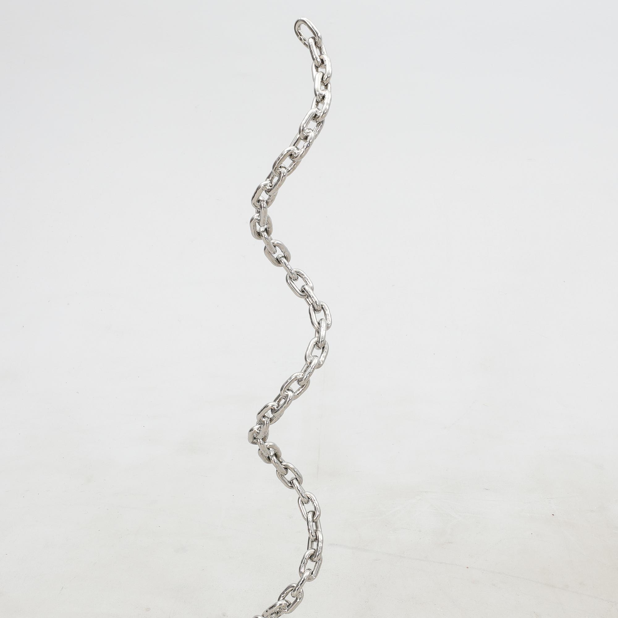 Oscar Reutersvärd, chain, "Aspiring Movement" signed.