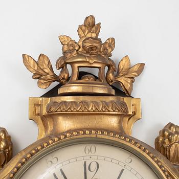 A Gustavian giltwood cartel clock by A. Bourdillon (watchmaker active in Stockholm 1761-99).