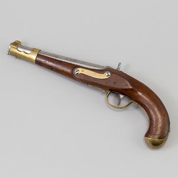 A first half of the 19th century percussion lock pistol.