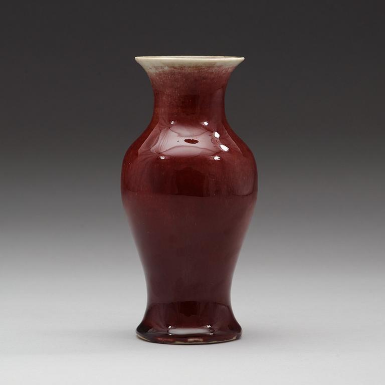 A sang de boef glazed vase, Qing dynasty, 19th Century.