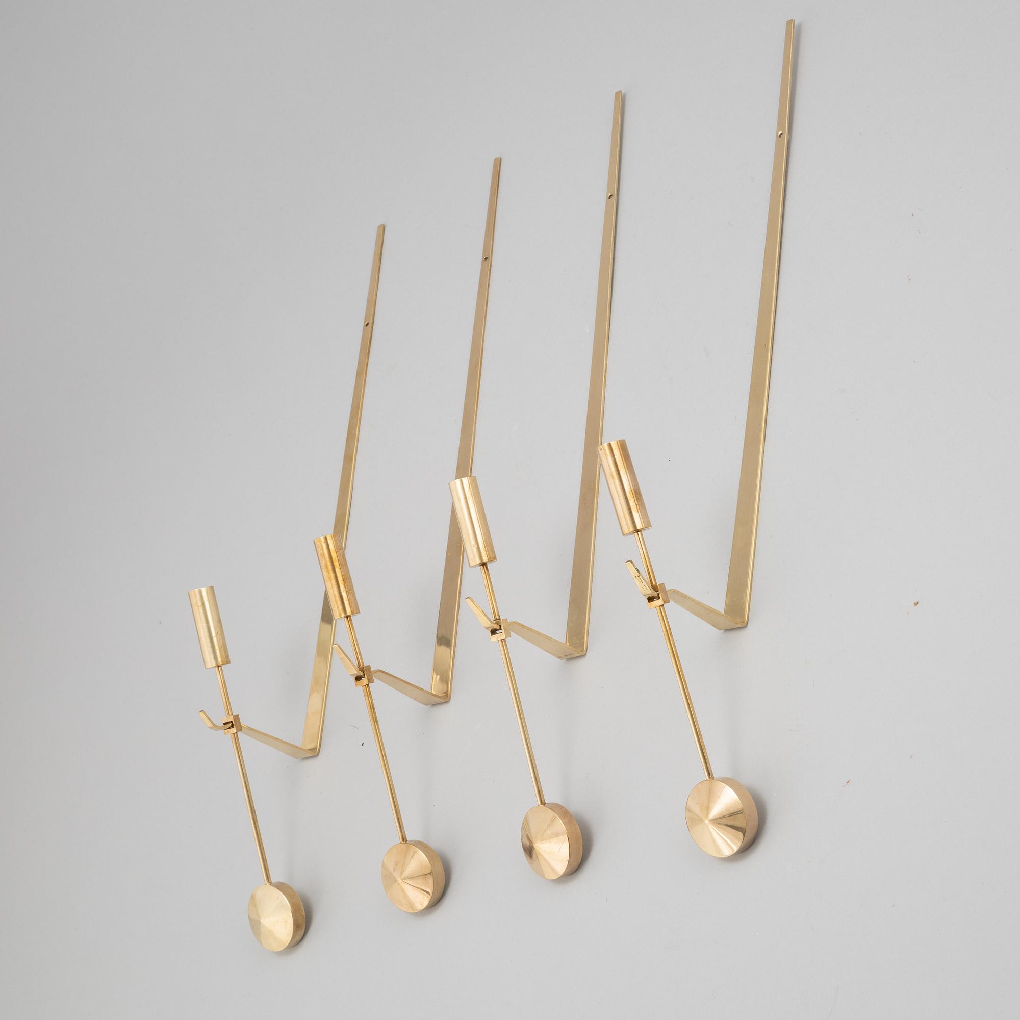 Pierre Forsell, four 'Pendeln' brass wall sconces, Skultuna.