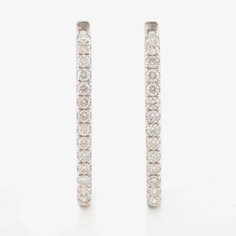 Earrings with brilliant-cut diamonds.