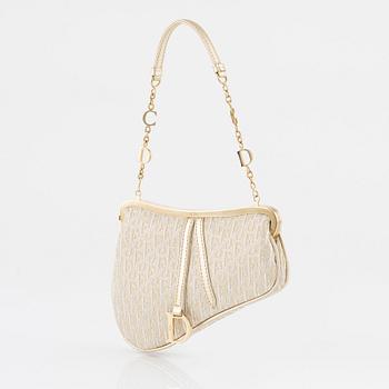 Christian Dior, A vintage 'Mini saddle clutch'.