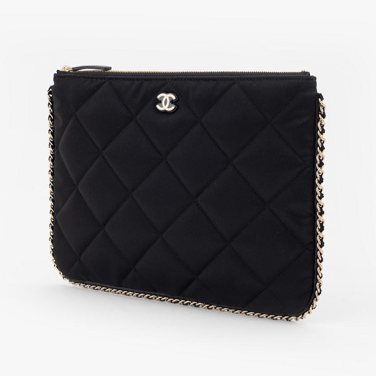 Chanel, a black satin clutch, 2021.