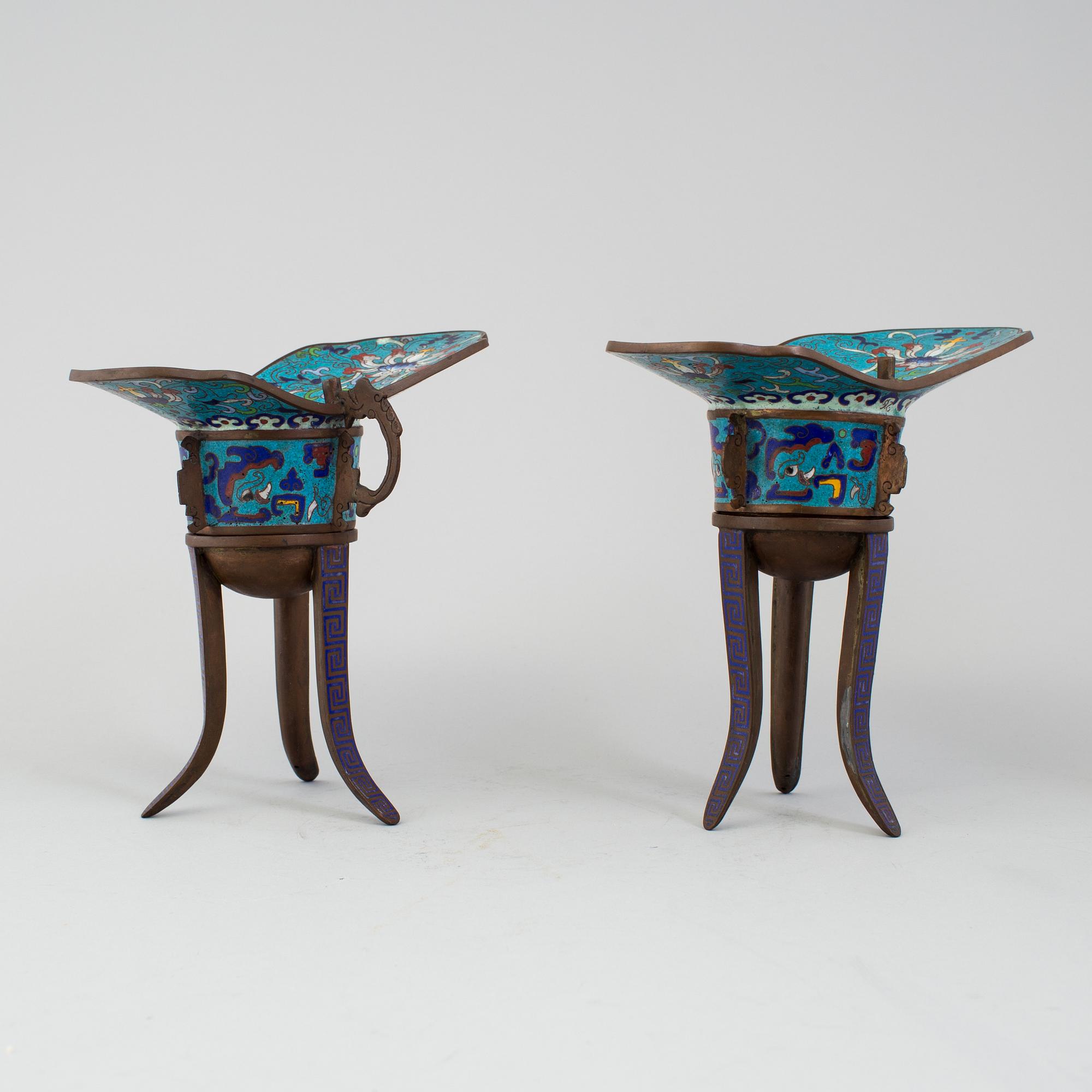 A pair of chinese cloisonné tripod wine vessels, 20th century.