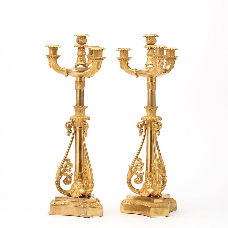 A pair of French Louis Philippe 19th century gilt bronze candelabra.