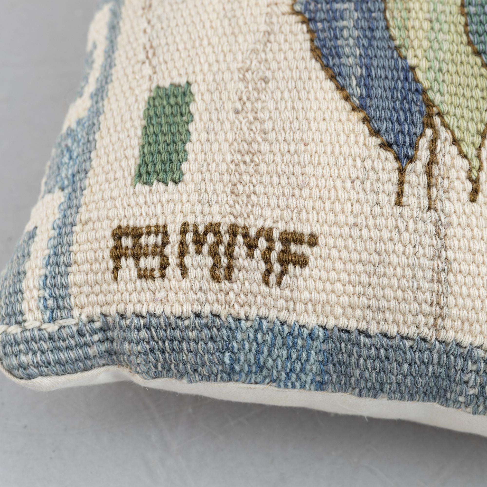 Märta Måås-Fjetterström, a tapestry weave textile/cushion, 'Blomlapp' ('Pingstlilja'), signed AB MMF, Sweden.