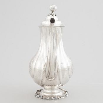 A Swedish Silver Rococo-Revival Coffee Pot, mark of Christian Hammer, Stockholm 1852.