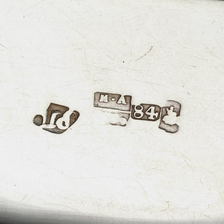 Two Russian mid 19th century parcel-gilt dishes, marked Carl Ekqvist, S:t Petersburg and unidentified maker, Moscow.