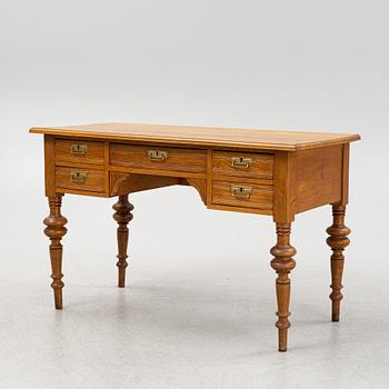 A renaissance style oak writing desk, end of the 19th Century.