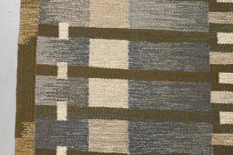 Margareta Grandin-Nettles, a carpet, flat weave, ca 249 x 167 cm, signed GLH MG.