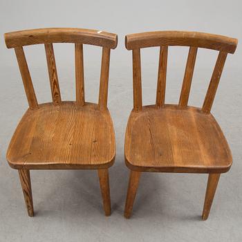 A pair of "Utö" pinewood chairs by Axel Einar Hjorth in the 1930's.