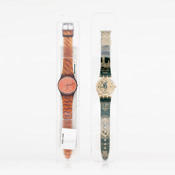 Two Swatch watches from the olympic games in Atlanta 1996.