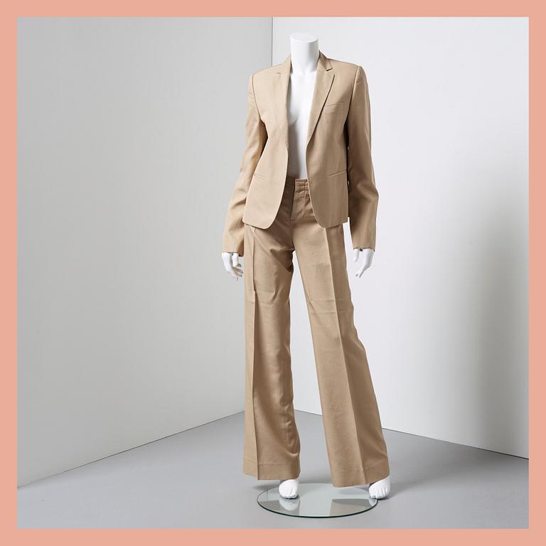 DRÄKT, Gucci, italiensk storlek 44/46.