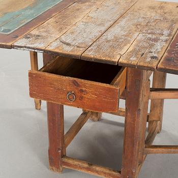 A mid 19th century gateleg table.