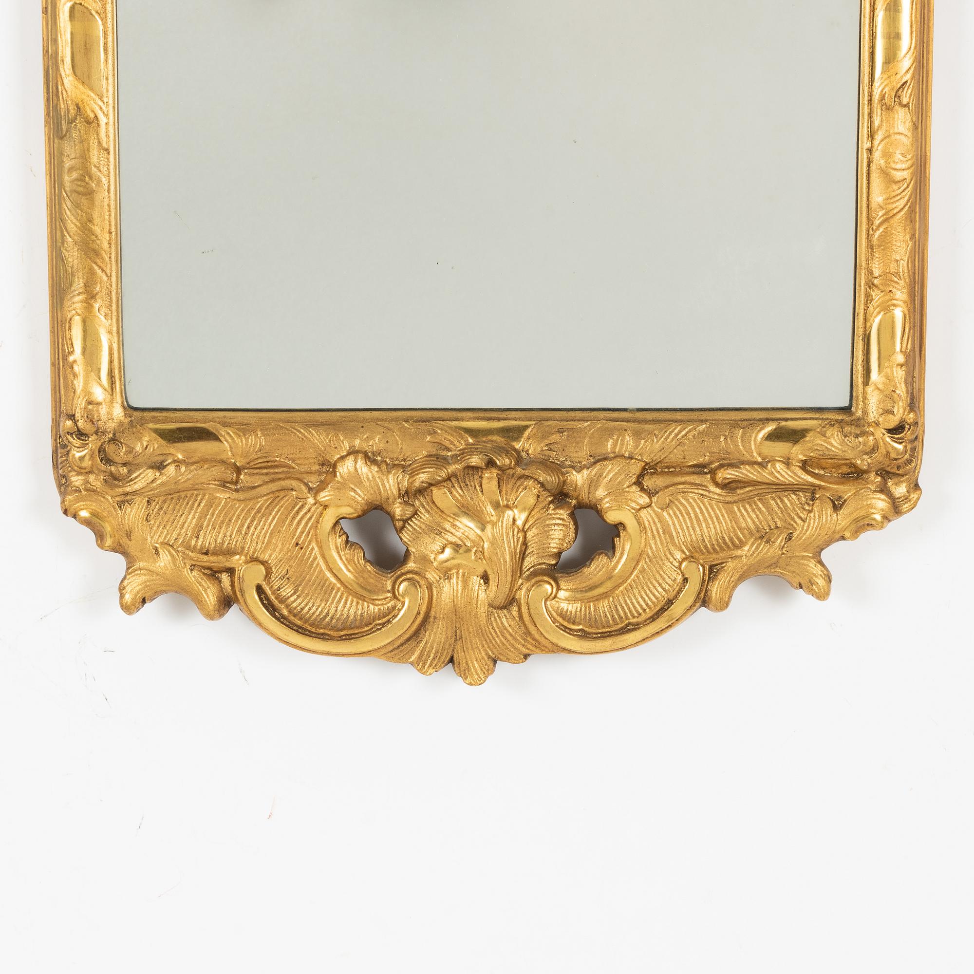 A Rococo style mirror, first half of the 20th Century.