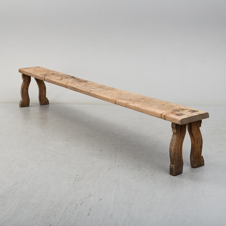 A 19th century folk art bench.