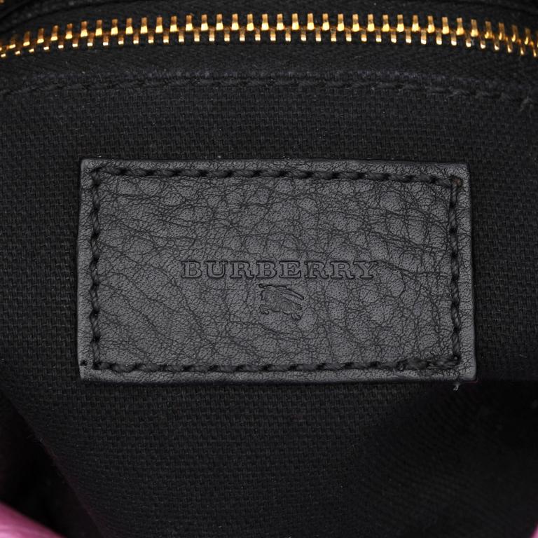 BURBERRY, a black leather shoulder bag.