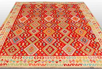 A CARPET, Kilim, ca 297 x 257 cm.