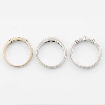 Three rings, 18K white gold with brilliant-cut and princess-cut diamonds.