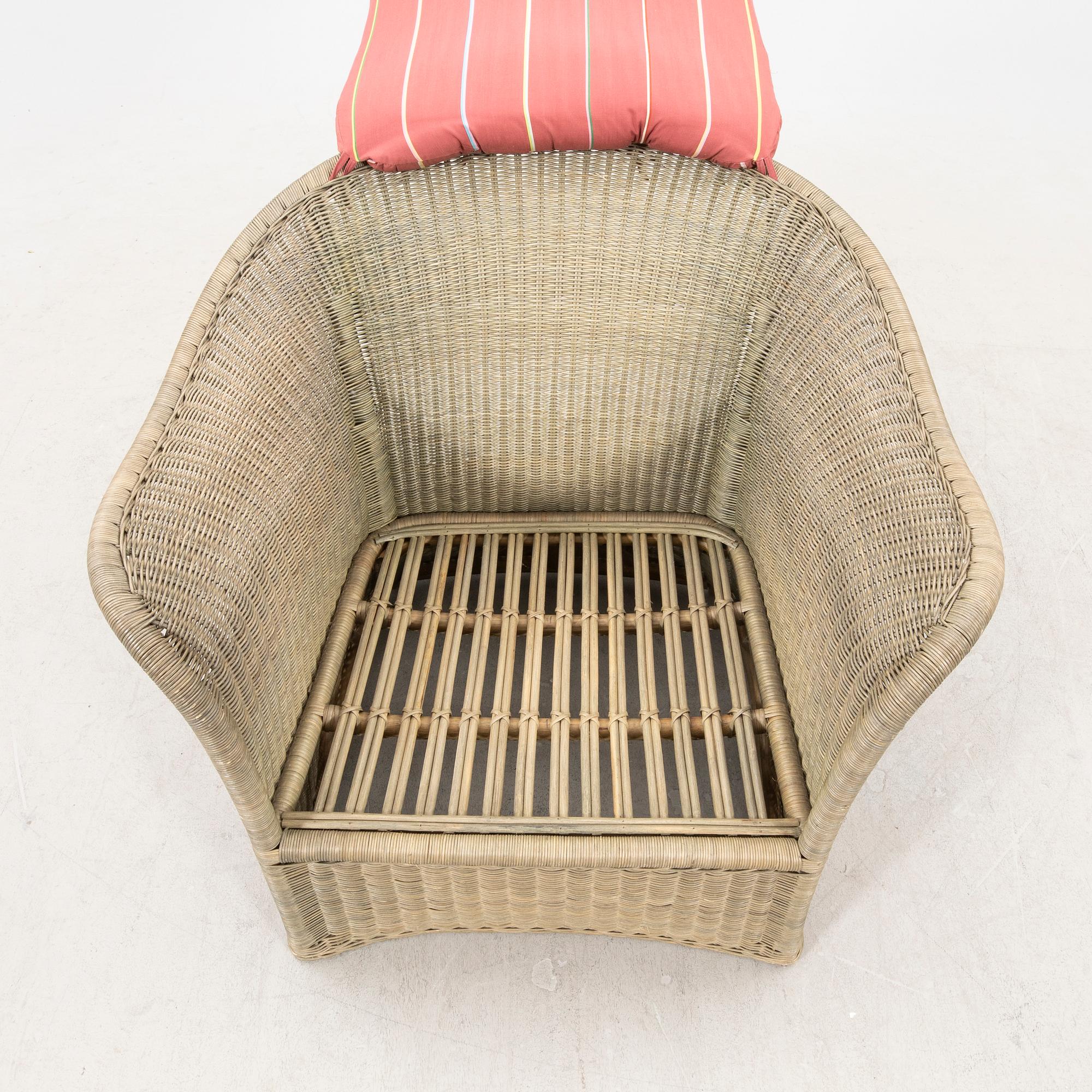 A Bonacina special edition rattan armchair 21st  century.