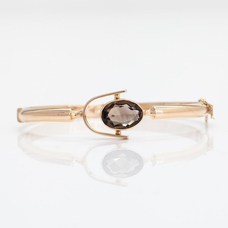 Eero Rislakki, a 14K gold and smoky quartz bracelet, Westerback, Helsinki 1960.