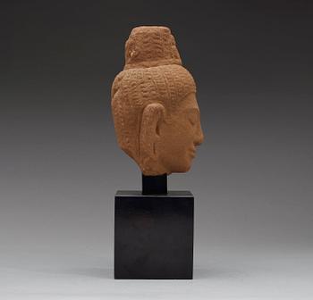 A sand stone figure of a Buddhas head, Thailand presumably 12th century.