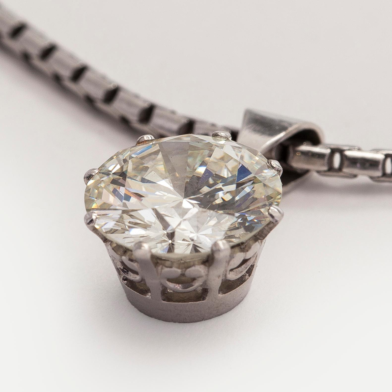 Riipus, briljanttihiottu timantti 3,60 ct, 18K valkokultaa.