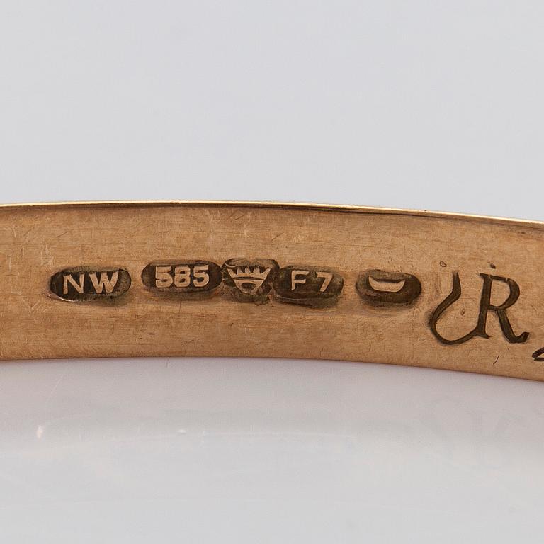 Eero Rislakki, armband, 14K guld och tigeröga, Westerback Helsingfors 1957.