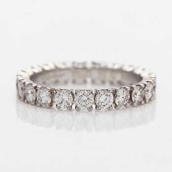Cartier, a platinum and brilliant-cut diamond eternity ring.