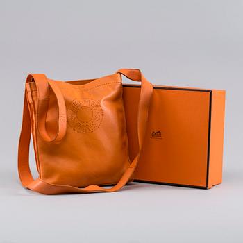 A "Clou de Selle" Hermès bag.