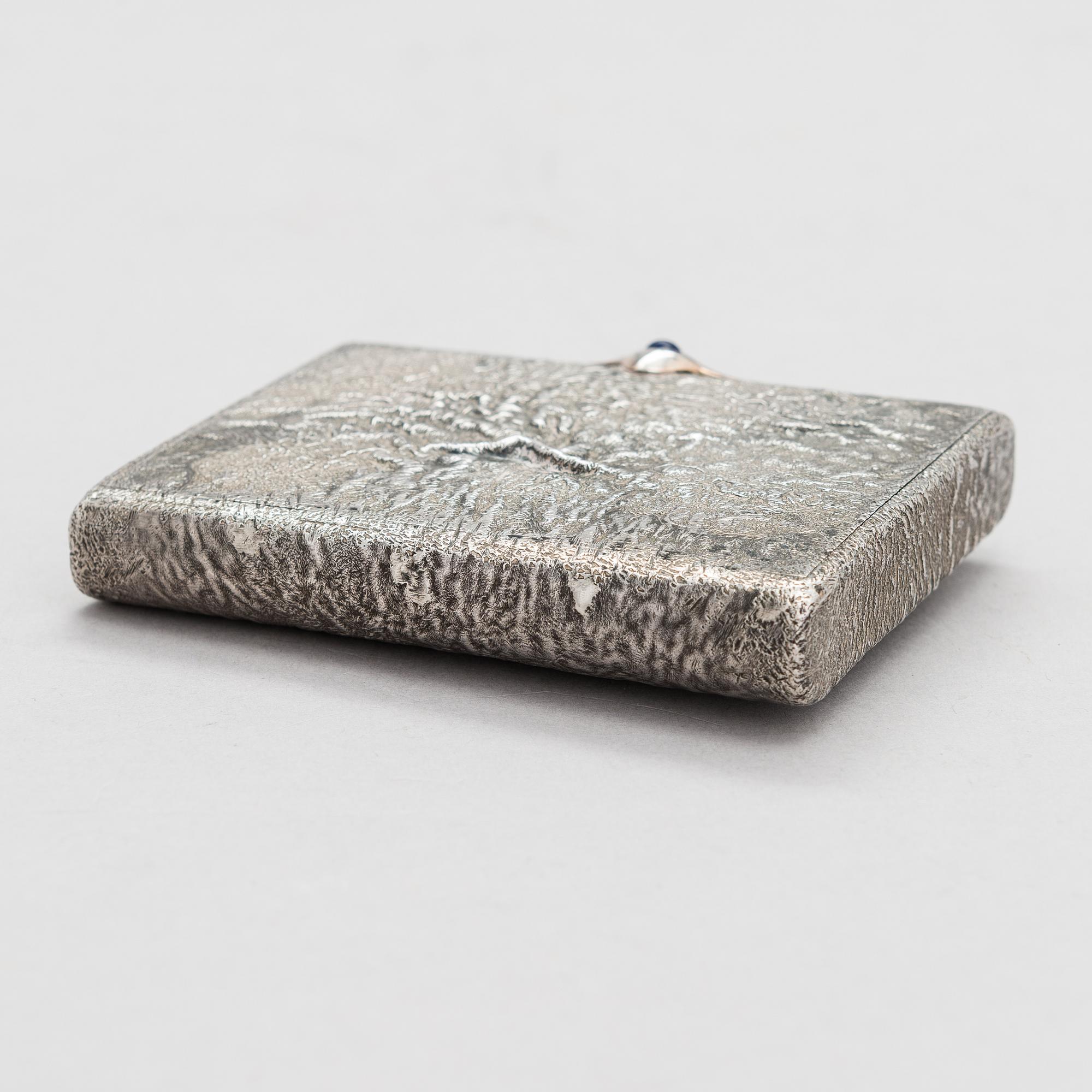 A Russian, early 20th century silver cigarette case, samorodok technique.
